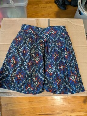 Sparkle & Fade Navy Ikat-Style Pleated Skirt with Red and Cream Accents